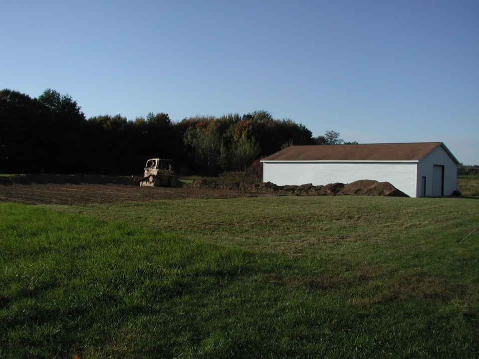 Top soil being removed. That's my 40'x64'x12' building in the background.