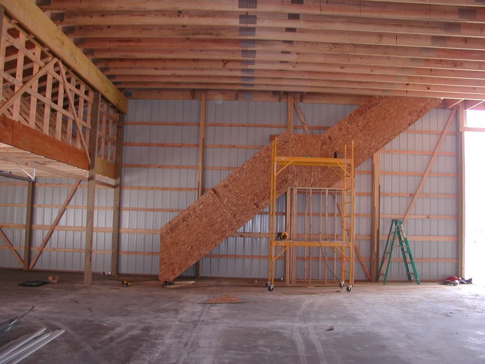 We have stairs! Under the stairs is my planned location of a toilet and sink. I had the pipe for the toilet and sink put in before the concrete was poured.