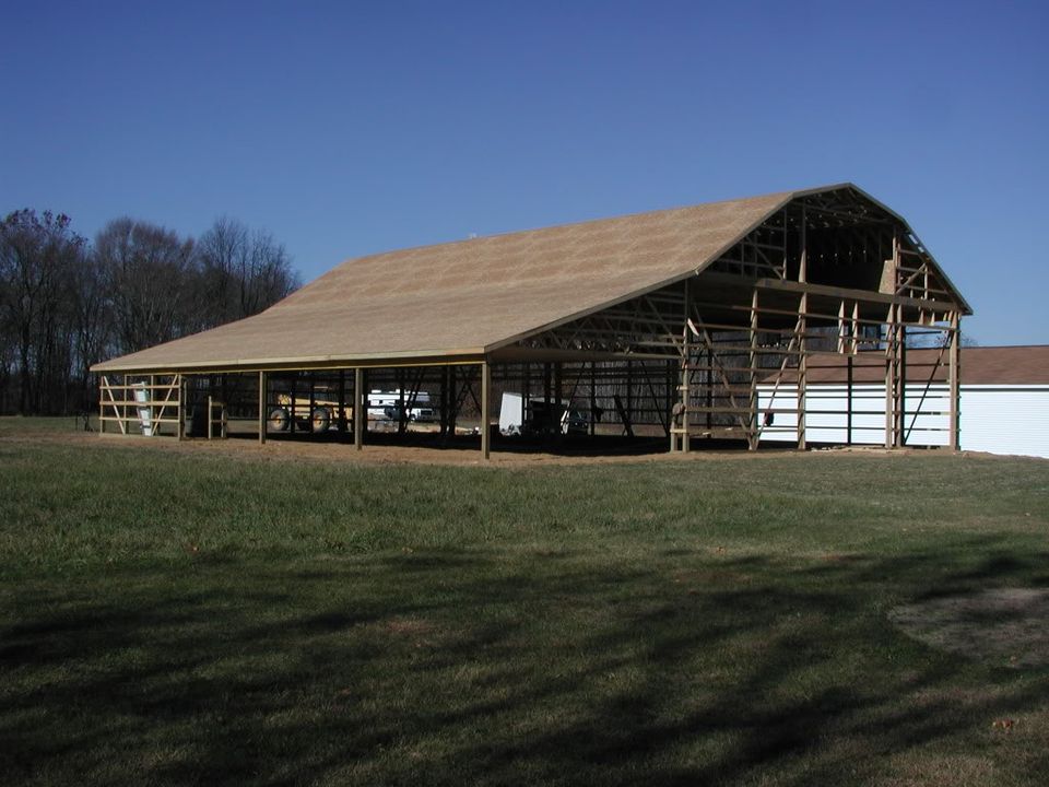 11/2/10 OSB is finished and the windows along the north side have been installed. The windows are installed up high to let light in over a RV or trailer.